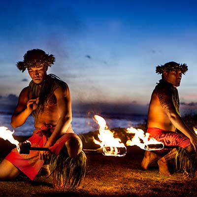 Enjoy this traditional Polynesian feast and show along the beach at your resort.