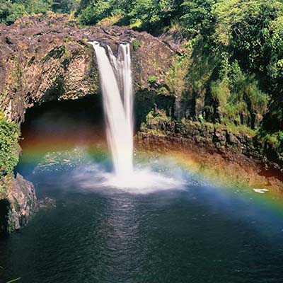 Visit some of the Big Island’s most beautiful waterfalls, including a chance to swim under one, on this picture-perfect day.