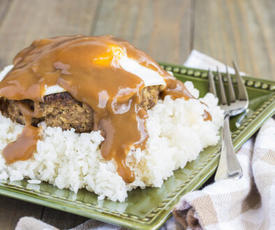 Loco Moco, a traditional Hawaiian dish of teriyaki flavored ground beef patty and a fried egg on a bed of rice, smothered in gravy