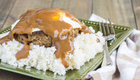Loco Moco, a traditional Hawaiian dish of teriyaki flavored ground beef patty and a fried egg on a bed of rice, smothered in gravy